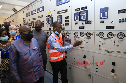  President Nana Addo Dankwa Akufo-Addo being briefed by Mr George Hommey (right), Director of Operations of Electricity Company of Ghana, on the operations of the Pokuase Bulk Supply Point. Picture: SAMUEL TEI ADANO