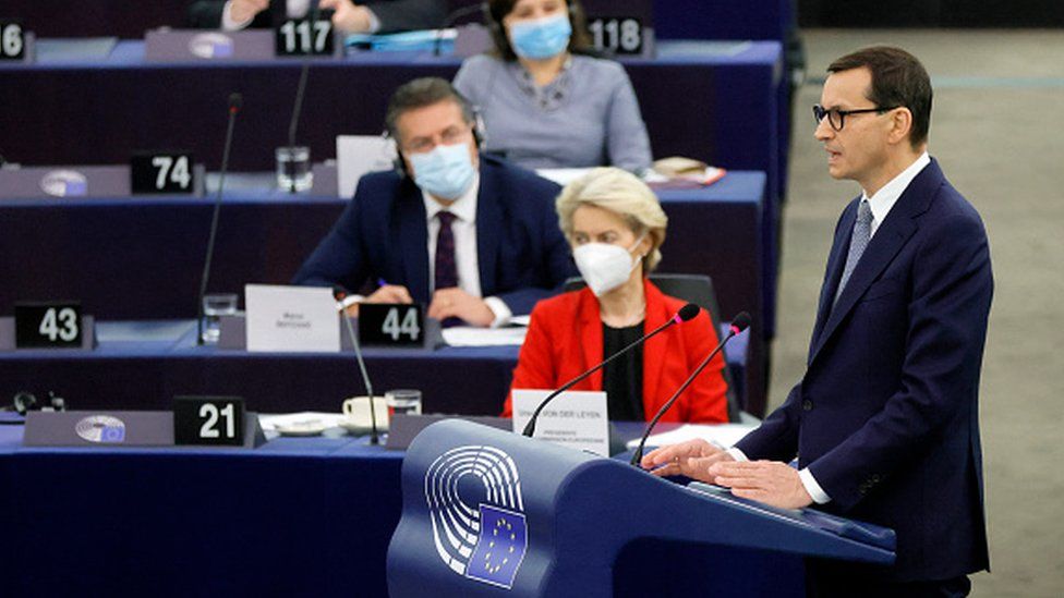 Poland's Prime Minister, Mateusz Morawiecki (R), said his country had been attacked in an "unjust" way