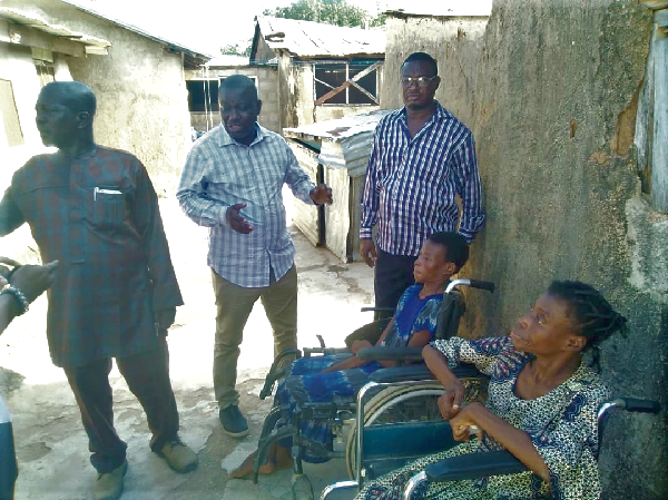 Isaac Adongo supports disabled family