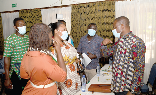 Dr Patrick Kuma-Aboagye (right), Director- General of the Ghana Health Service, engaged by some media personnel at  yesterday’s event. Picture: EBOW HANSON 
