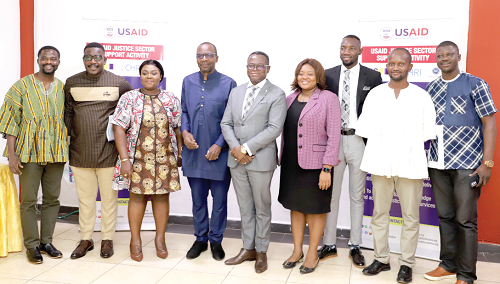 Justice Emmanuel Yonny Kulendi (5th from right), Justice of the Supreme Court, and Mr Roland Affail Monney (4th from left), President of the Ghana Journalists Association, with the media ambassadors after the event. Picture: GABRIEL AHIABOR