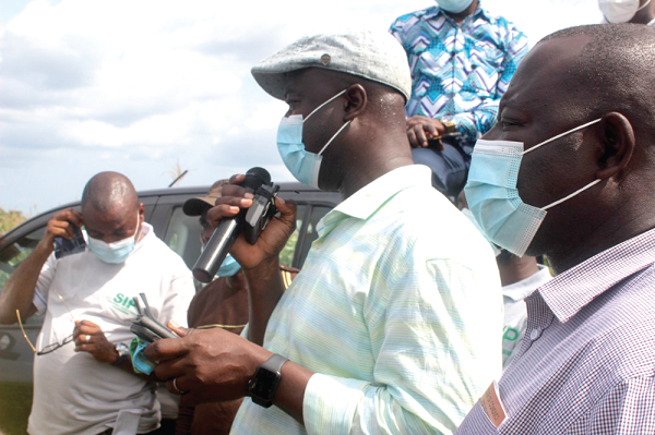  Dr Jasaw speaking to journalists after touring Cudjoe Abimash Farms