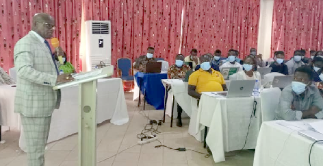 Dr. Arthur (left) addressing the participants