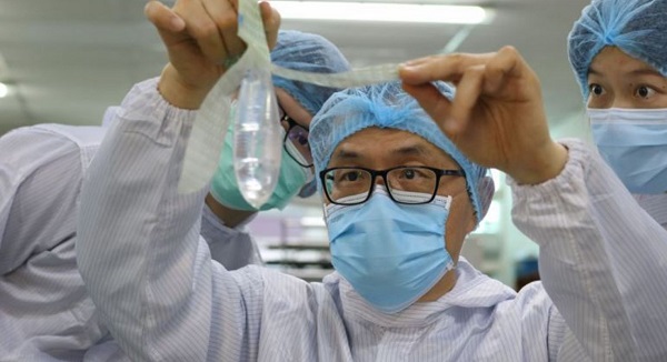 The condom 'attaches to the vagina or penis, as well as covering the adjacent area for extra protection', Mr Tang says