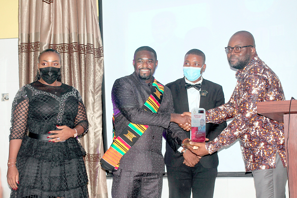 Dr Kofi Adu-Boateng (left), CEO, Endpoint Homeopathic Clinic, receiving his award. Picture: Maxwell Ocloo