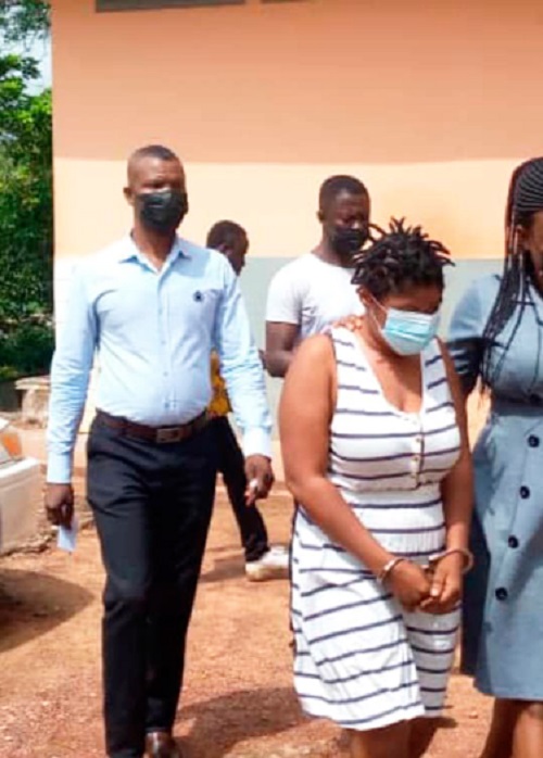 Ms Joana Krah being escorted from the court premises to begin her jail term