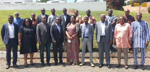 Participants in a group photo with the Chairman of the ECOWAS Regional Electricity Regulatory Authority (ERERA), Professor Honoré Bogler (4th right)