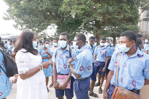 Ms Rita Odoley Sowah (left), Member of Parliament for La Dadekotopon, interacting with some students of the La Presbyterian Senior High School. Picture: Nii Martey M. Botchway