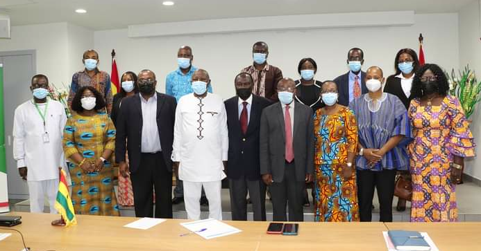 Members of the Board and some directors of the Ministry of Health  in a group photograph with Mr Kwaku Agyeman-Manu (4th right), Minister of Health, after the inauguration