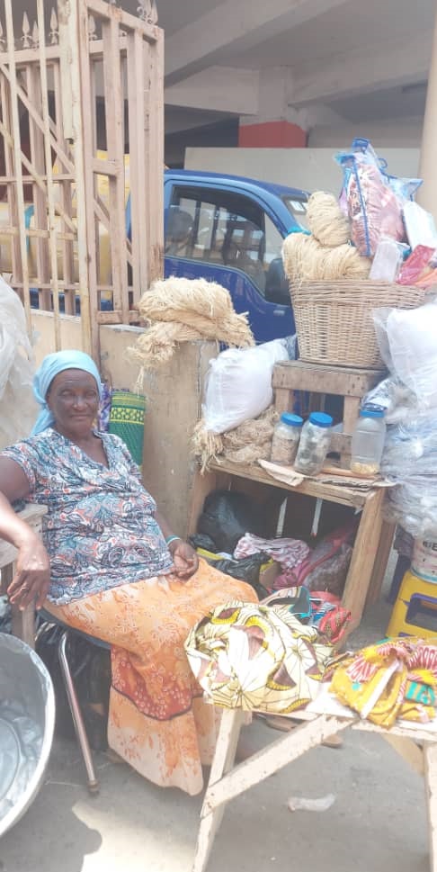 Sister Kai has sold burial items for years at Makola in Accra