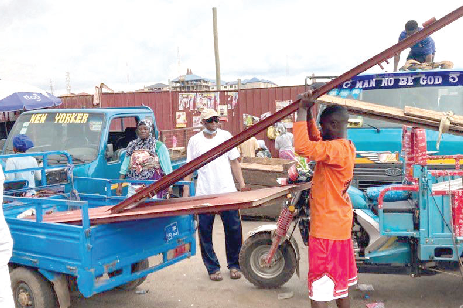 Some of the traders conveying their items in tricycles