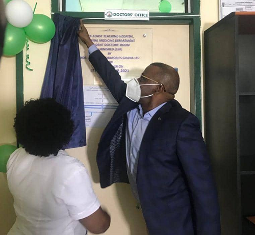 Dr Paul Sekyere -Nyantakyi the Chief Executive of MDS-Lancet and Mrs Jacobs unveiling the plaque at to the facility