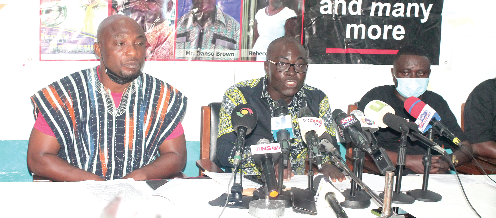 Mr Fred Forson (middle), PRO, Coalition of Aggrieved Customers of Menzgold Ghana  speaking at the press conference. With him are Mr Isaac Nyarko (left), Chairman, and his deputy, Mr Francis Owusu (3rd left). Picture: Maxwell Ocloo