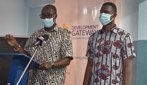 Ghana's Country Lead for Gateway Development, Mr Wekem Raymond Avatim (left) speaking at the press conference. With him is Mr Fred Gyasi, a Website and Fertilizer Statistics Specialist.