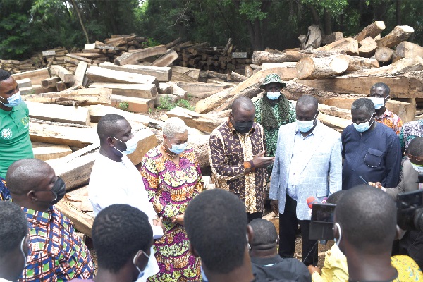 Mr Samuel Abu Jinapor (4th left), Minister of Lands and Natural Resources, handing over the Rosewood impounded to the board of trustees of the National  Cathedral. With him are Rev Professor Paul Frimpong (2nd right), Rev Dr Joyce Aryee (3rd left), both members of the board, Dr John Kumah (2nd left), Deputy Minister of Finance, and Mr Benito Owusu-Bio (right), Deputy Minister of Lands and Natural Resources.
