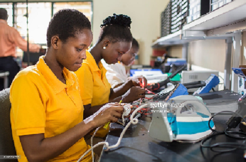 Girls being trained in electrical repairs