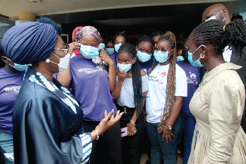Mrs Ursula Owusu-Ekuful (left),  and Ms Ama Pomaa Boateng (right), Minister and Deputy Minister of Communications and Digitalisation respectively, interacting with some participants after the opening ceremony. Picture: ESTHER ADJEI 