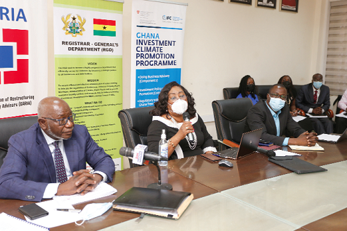Mrs Jemima Oware (middle), Registrar General, making some remarks as  Mr Felix Addo (left), President, Ghana Association of Restructuring & Insolvency Advisors, and Mr Hamidu Solo (right), Project Lead, International Finance Corporation, look on. Picture: NII MARTEY M. BOTCHWAY