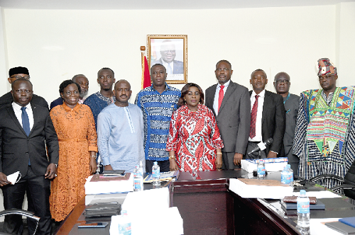 Mrs Cecilia Abena Dapaah (5th right), Minister of Sanitation and Water Resources, interacting with the board members after their inauguration. Picture: EBOW HANSON