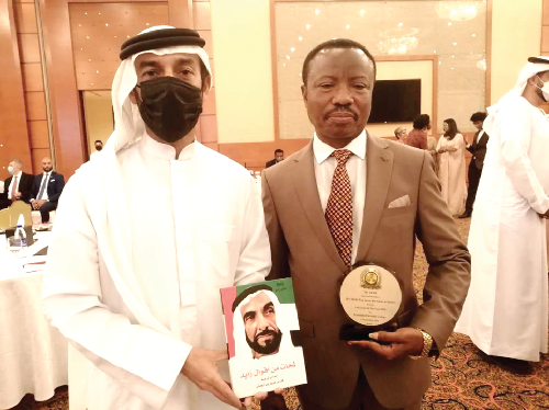 Bishop John Essel (right), Founder of Knutsford University College, and Sheikh Salem Al Qasimi, an official of the International Sustainability and Growth Summit, with one of the awards