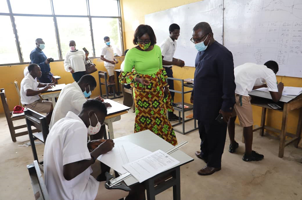  Mrs Gifty Twum-Ampofo (2nd from right), Deputy Minister of Education in charge of T-vet, and Mr Asamoah Duku (right), Principal, Tema Technical Institute, inspecting students writing exams.  Picture: Samuel Tei Adano
