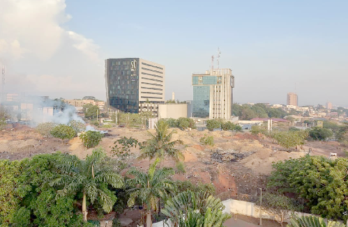 The area engulfed in smoke from the burning of the garbage