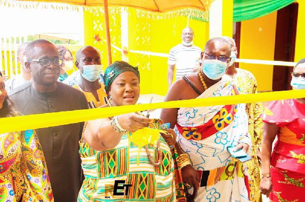 Naana Dagodjo Domaley I, the Paramount Queen Mother of the Ada Traditional Area, cutting the tape to inaugurate the project. 