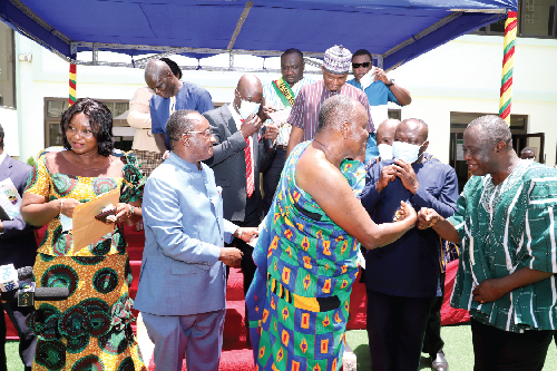 Nana Otuo Siriboe II (2nd from left), Chairman of the Council of State, exchanging pleasantries with Mr Yaw Frimpong Addo (right), a Deputy Minister of Food and Agriculture, after the launch. Those with them include Dr Owusu Afriyie Akoto (left), Minister of Food and Agriculture. Picture: GABRIEL AHIABOR 