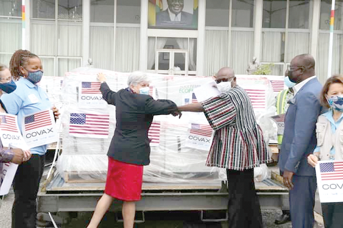 Alhaji Mahama Asei Seini, Deputy Minister of Health, thanking Mrs Stephanie Sullivan (left), US Ambassador to Ghana, after the presentation