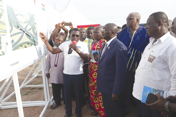 Christian Nti (with a pointer), acting Chief Executive, Ghana Highway Authority, explaining the Phase 2 Tema Motorway Interchange project to Vice-President Dr Mahamudu Bawumia. With them are Kwasi Amoako-Attah (right), Minister of Roads and Highways, and Henry Quartey (2nd from right), Greater Accra Regional Minister. Picture: SAMUEL TEI ADANO