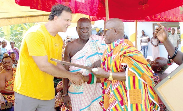  Ray Youssef (left), a founder of BWB, exchanging pleasantaries with one of the elders of the community during the inaugural ceremony