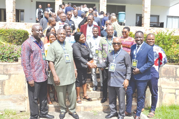 Dr Archibald Yao Letsa (3rd from right), the Volta Regional Minister; James Oppong-Mensah (2nd from left), Chief Director, Office of the Head of Local Government Service; Augustus Awity (left), the acting Volta Regional Coordinating Director, and some of the participants