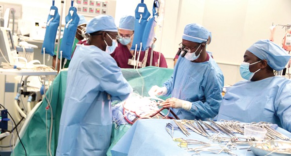 Dr Baffoe Gyan (2nd from right) performing surgery at the UGMC