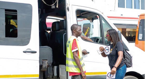 Eunice Osei-Tutu (right), Sustainability Responsibility Manager of Pernod Ricard, educating one of the drivers at the Obra Spot near Circle