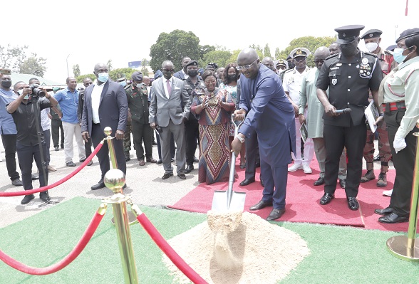   Vice-President Dr Bawumia (with shovel) cutting the sod for the construction of offices for the military. With him is Akosua Frema Osei-Opare, Chief of Staff. Picture: SAMUEL TEI ADANO
