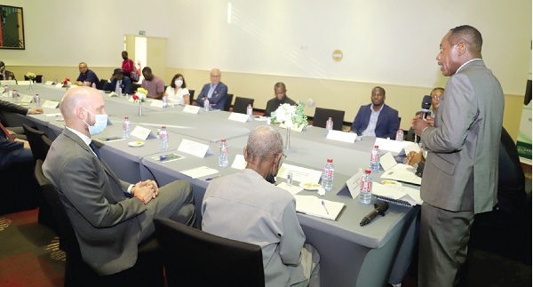  Stephen Antwi (right), President of the Ghana German Economic Association, addressing the participants in the meeting in Accra