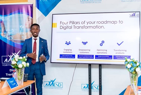 The Head of Digital Transformation for Axxend Consult, Daniel Sowah speaking to the participants