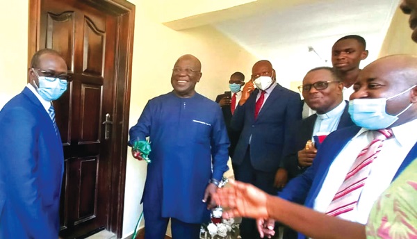 Sir Sam Esson Jonah (2nd from left), Chancellor of the UCC, after cutting the tape for the official opening of the D-HUB