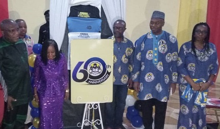 Members of CHASS and officials of the GES displaying the logo for the 60th anniversary. They include Mrs Nsiah-Asamoah (2nd from left ), the Eastern Regional Director of the GES; Alhaji Yakubu Abubakar (2nd from right), the National President of CHASS, and Mr Seth Acheampong (left), the Eastern Regional Minister