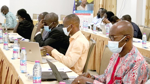 Some representatives of the various agencies at the review workshop. Picture: DELLA RUSSEL OCLOO