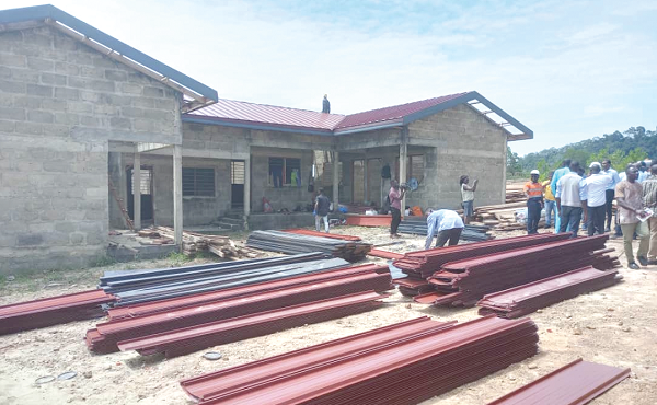 Some of the buildings being roofed