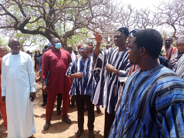 Shani Alhassan Shaibu, Northern Regional Minister showing the Vice President the extent of damage