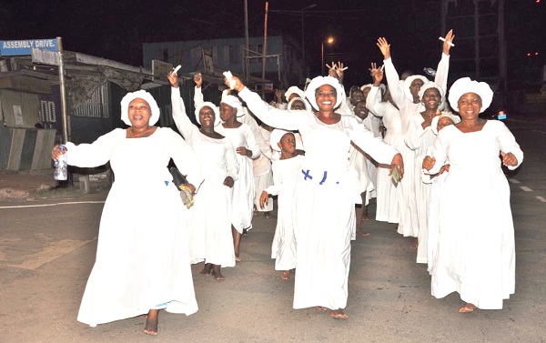  Members of the Celestial Church of Christ reliving the Resurrection in Ho 