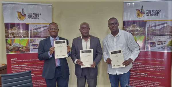 Professor Richard K. Amankwa (middle), Sulley Amin Abubakar (right), and Dr Sulemanu Koney (left) displaying the agreement after the signing