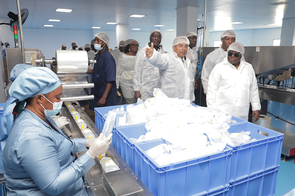 President Akufo-Addo (right) being conducted round the facility by Dhananjay Tripathi (2nd from left), CEO, Atlantic Lifesciences, after its inauguration. Looking on (arrowed) is Alan Kyerematen, Trade Minister. Picture SAMUEL TEI ADANO