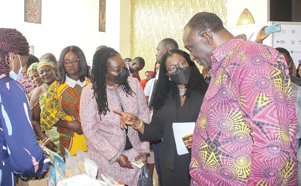  Alan Kyerematen (right), Minister of Trade and Industry; Elsie Addo Awadzi (2nd from right), Second Deputy Governor, Bank of Ghana; Ursula Owusu-Ekuful (3rd from right), Minister of Communications and Digitalisation, in an interaction after the summit. Picture: ERNEST KODZI
