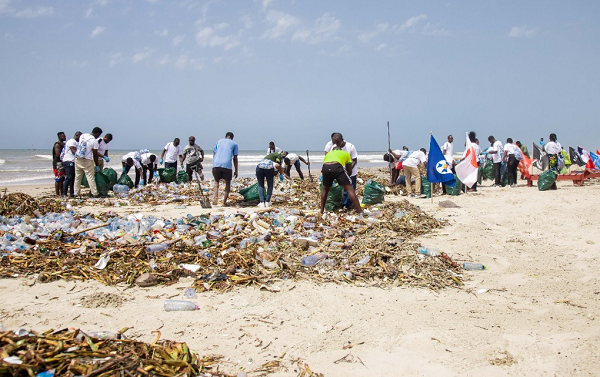 Some of the officials and members of the United Kingdom-Ghana Chamber of Commerce (UKGCC) embarking on the clean-up exercise at the Labadi beach to mark World earth Day in Ghana