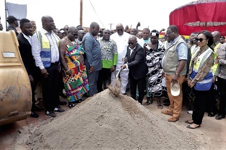 President Akufo-Addo (with shovel) cutting the sod for the Dome-Kitase road at Kwabenya. Picture: Samuel Tei Adano