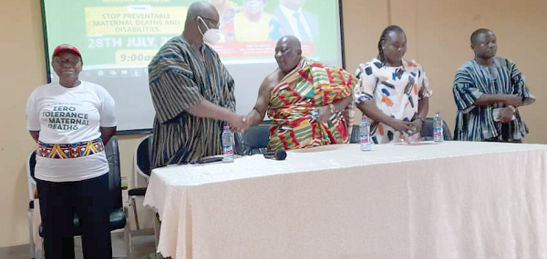  Dr Prince Quashie (2nd from left) exchanging pleasantries with Nana Dr Amankona Diawuo II, Omanhene of the Berekum Traditional Area, at the launch