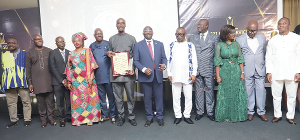 Vice-President Dr Mahamudu Bawumia (arrowed) with some winners of the Civil Service Awards. Picture: Samuel Tei Adano